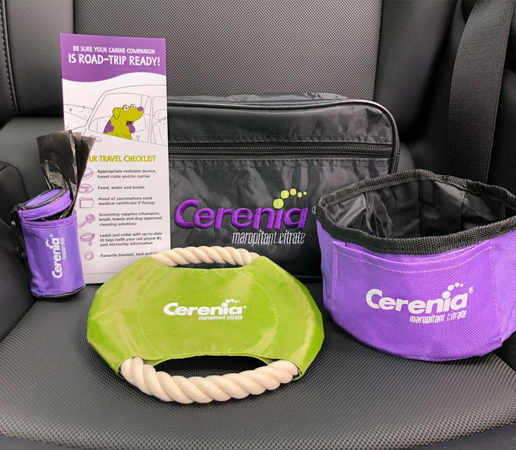 Assorted purple and green dog toys branded with Cerenia logo